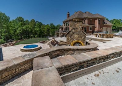 Fire Pit with Blue Glass, stonework as part of an outdoor living space