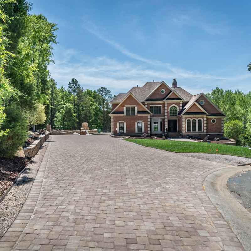 Paver driveway installed at a home along Lake Norman, NC by Benton Outdoor Living