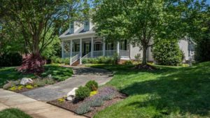 Landscape Design outside of house by Benton Outdoor Living in Charlotte