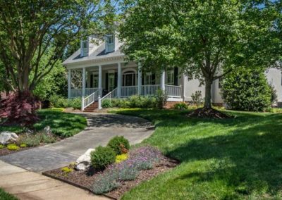 Landscape Design outside of house by Benton Outdoor Living in Charlotte