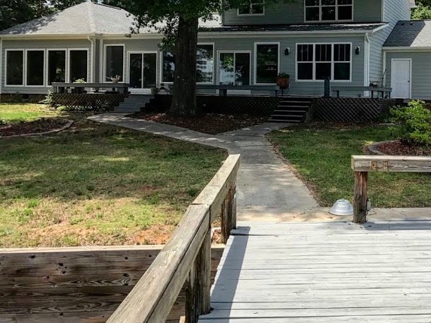 Lake Wylie, SC backyard landscaping transformation before photo of dock and yard