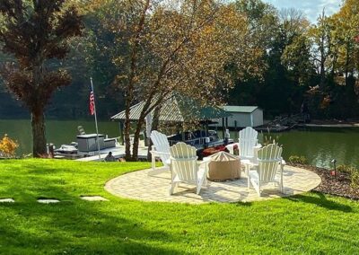 Lakeside backyard round patio with pavers in the Charlotte Area