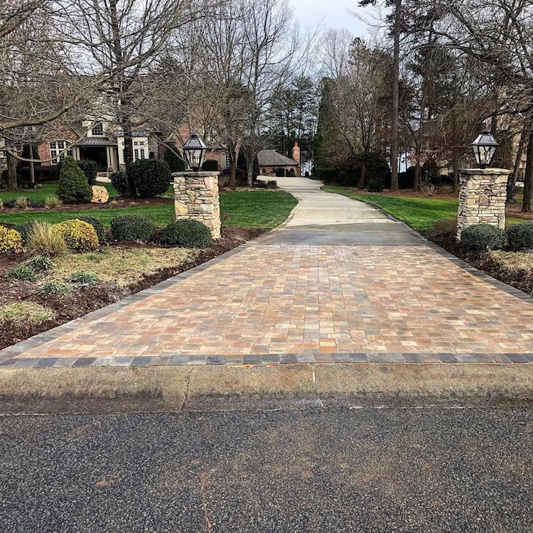 Lake Norman paver driveway entrance with paver light posts