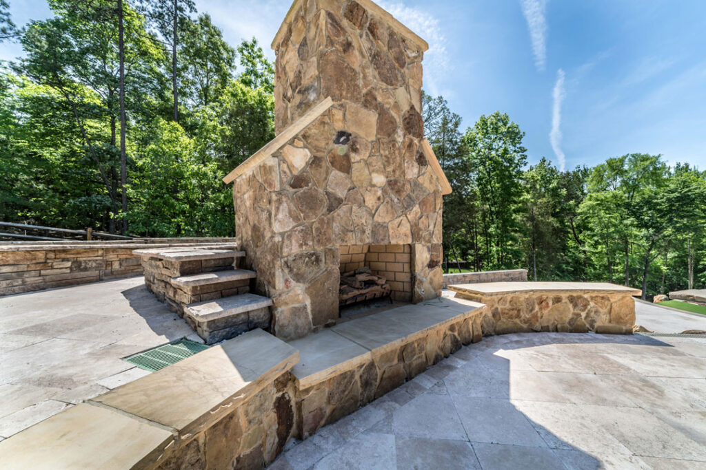 Outdoor Fireplace built by Benton Outdoor Living in the Charlotte, NC area backyard