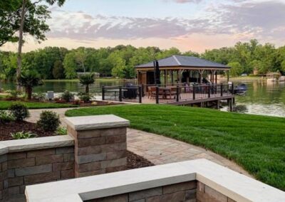 Lake Wylie Fire pit overlooking the lake installed by Benton Outdoor Living